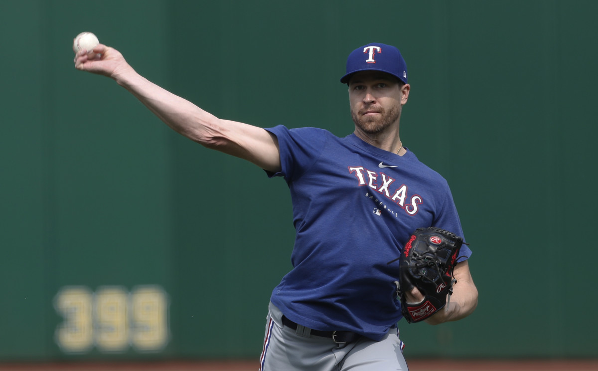 May 23, 2023; Pittsburgh, Pennsylvania, USA; Texas Rangers pitcher Jacob deGrom (48) throws in the outfield before the game against the Pittsburgh Pirates at PNC Park. Mandatory Credit: Charles LeClaire-USA TODAY Sports